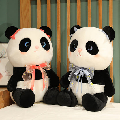 Panda plush toy with a cute bow.