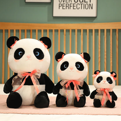 Panda plush toy with a cute bow.