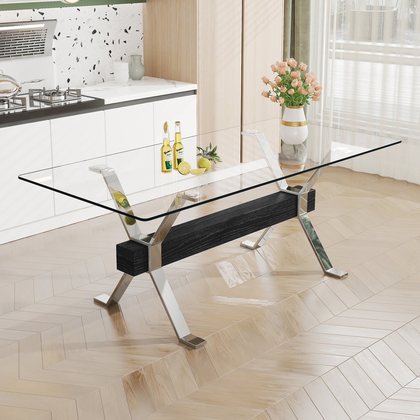 Modern tempered glass dining table with silver plated metal legs.