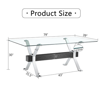 Modern tempered glass dining table with silver plated metal legs.