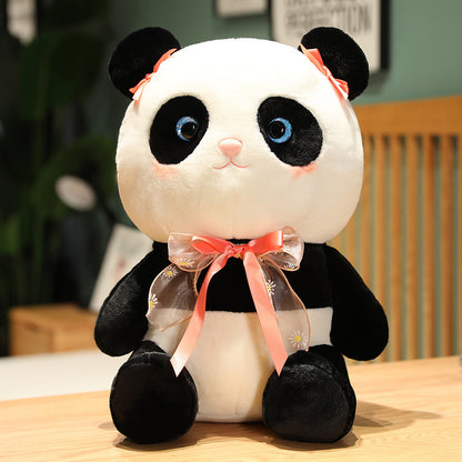 Panda plush toy with a cute bow.